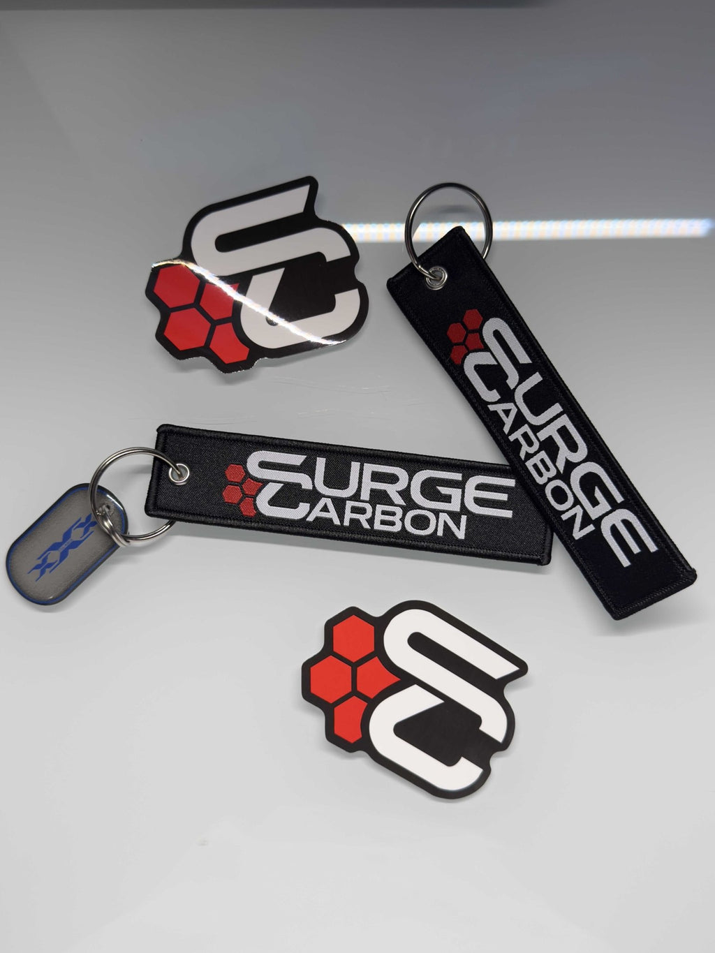 Surge Carbon Keychain and Sticker Pack